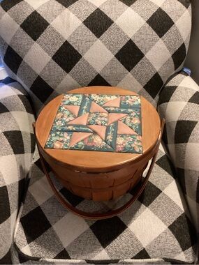 vintage wood and wicker sewing basket featuring “Churn Dash Star" pattern lid